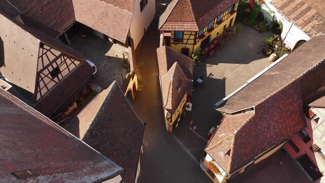 Aerial Shot of Streets in Eguisheim village in the Alsace province, France. Picturesque village in a Sunny Summer Day