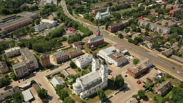Aerial 4K video from drone to Daugavpils Orthodox Cathedral of the Holy Martyrs Boris and Gleb, Martin Luther Cathedral, Roman Catholic church of the Blessed Virgin Mary. Daugavpils, Latvia, Latgale, 