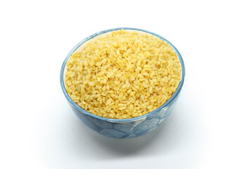 Moong Dal Namkeen, Indian Namkeen Snack Food, Moong dal isolated served in a blue bowl in top view, white background. Mixture, Yellow split salty mung dal or moong dal namkeen. Top close up