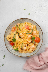 Fettuccine pasta with shrimp, tomatoes and herbs