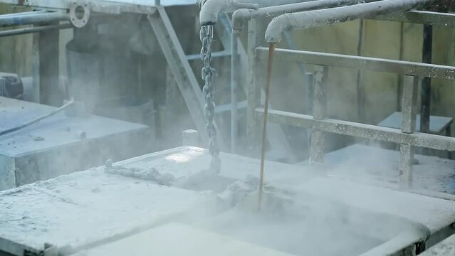 Adding liquid chemicals to soap ingredients for combustion in the feed hopper tank