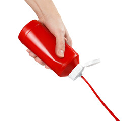 Hand squeezing ketchup out of a plastic bottle, cut out