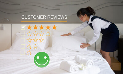 Young asian hotel maid making the bed. Show rating of service experience, evaluate quality of service leading to reputation ranking of hotel business. - obrazy, fototapety, plakaty