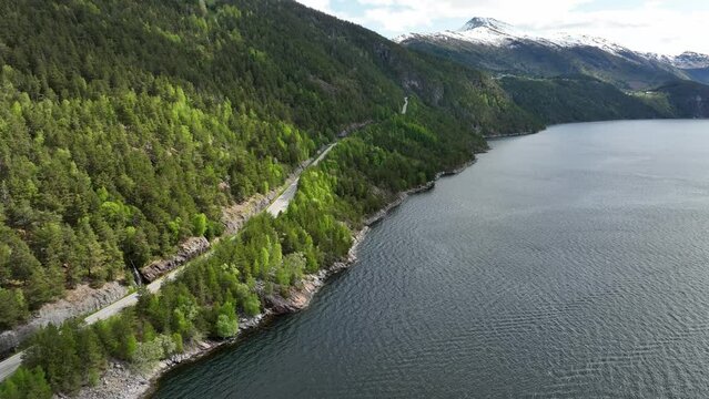 Road 650 to Liabygda in More and Romsdal Norway - Aerial above see looking towards road just after ferry connection to Stranda