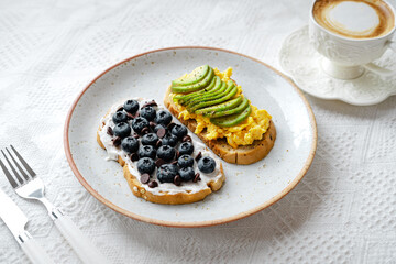 breakfast Toast Omlet and avocodo and blueberry
