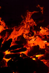 Fire flames on black background, Blaze fire flame texture background, Beautifully, the fire is burning, Fire flames with wood and cow dung bonfire