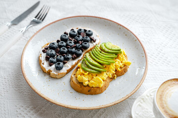 breakfast Toast Omlet and avocodo and blueberry