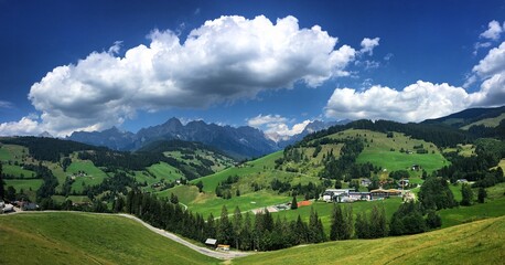 Fototapeta na wymiar Landscape with mountains and sky in Maria Alm, Austria, July 2018