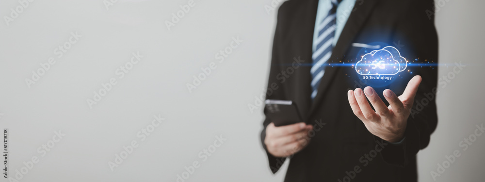 Fototapete businessman with 5g technology hologram, 5g networking, data forwarding and internet use efficiency 