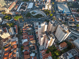 Campinas, Sao Paulo, Brazil. June 23, 2023. Aerial image of three central districts of Campinas: Vila Itapura, Cambuí and Jardim Guanabara. Sunset and blue sky.