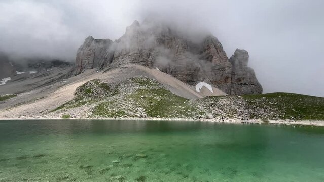 Panoramic view of Pilato lake at the feet of Mount Redentore in Italy