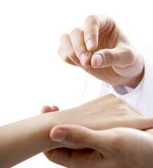 Hand of doctor performing acupuncture therapy with isolated on transparent background, Traditional...