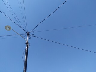 power lines on a blue sky