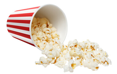 Delicious popcorn falling out of red striped paper cup, cut out
