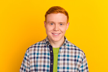 Young casual man portrait isolated on yellow color background