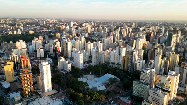 Campinas, Sao Paulo, Brazil. June 23, 2023. Aerial image of three central districts of Campinas: Vila Itapura, Cambu&iacute; and Jardim Guanabara. Sunset and blue sky.