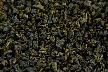Loose Leaf of Tea. Black dry Tea Wallpaper. Mix Black and Green Tea Leaves. Close Up, Macro. Top...