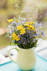 Bouquet with yellow and blue flowers