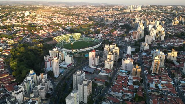 Campinas, Sao Paulo, Brazil. June 23, 2023. Aerial image of three central districts of Campinas: Vila Itapura, Cambu&iacute; and Jardim Guanabara. Sunset and blue sky.
