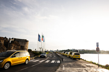 Local taxi traffic on the road of Nessebar, Bulgaria.