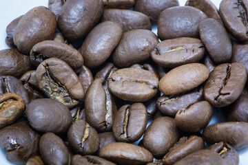 Roasted Arabica coffee beans, Coffea arabica which ready to be grind