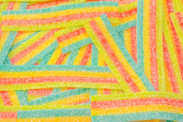 Colorful juicy gummy candies background. Top view. J