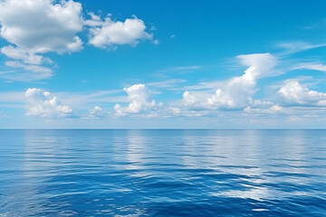 Obraz na płótnie Canvas Calming summer natural marine blue background . sea and sky with white clouds photography