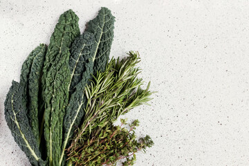Black kale leaves, rosemary and thyme