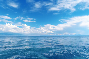 Obraz premium Calming summer natural marine blue background . sea and sky with white clouds photography