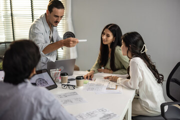 Product manager collaborates with startup team's prototype engineer to develop, test new 3d printing design. Brainstorming on how to make product in an efficient and cost-effective way for right user