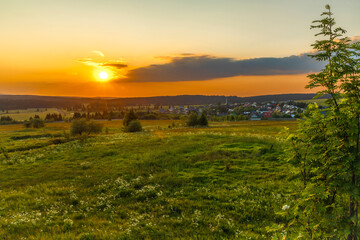 Fototapeta na wymiar Color evening meadow near Bozi Dar village with sunshine