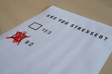 Stressed guy concept: say you are not stressed but lie.
