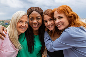 portrait group friends multigeneration - women of different ages multiracial -