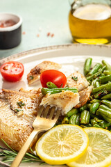 Grilled fish fillet with vegetables. Healthy food concept. place for text, top view