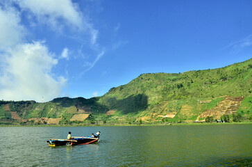 Fototapeta na wymiar Telaga Merdada (Merdada Lake) at Dieng Plateau with blue sky, holiday