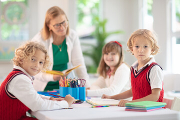 Fototapeta premium Kids in school. Children in class.