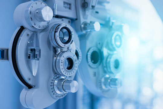 Phoropter eyesight measurement testing machine, Eye health check and ophthalmology concept. Web banner size. Copy space.