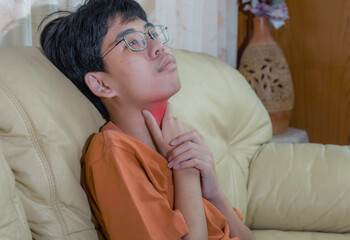 Little ill boy get sore throat and sickness in inflaming or choking can't breath with unhappy....