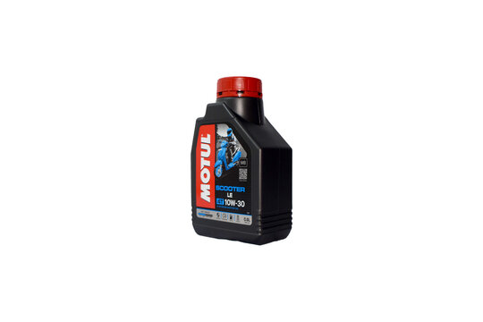 Motul scooter engine oil on a white background