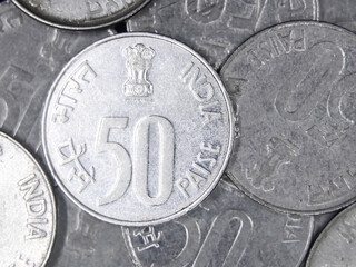closeup macro shot of shiny vintage 50 paise silver coin of india 