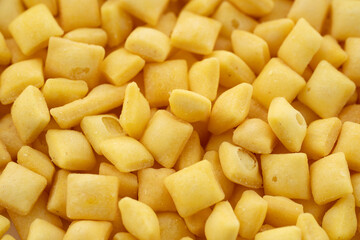 Cinnamon crunch on white background. A solid background of kid's breakfast cereal