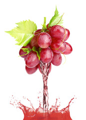 Pouring freshly squeezed juice from grape on white background