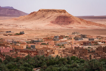 Town and oasis of Tinerhir. "Gorges du Dades" Morocco. Sitting in the rain shadow of the Central Atlas, the "Gorges du Dades" presents a dramatic landscape: ancient rust-red and mauve mountains stripp