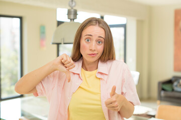 Fototapeta premium pretty blond woman feeling confused, clueless and unsure, weighting the good and bad in different options or choices