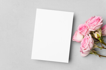 Blank invitation or greeting card mockup with roses flowers
