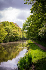Fototapeta na wymiar Landscape with canal, Leeds Liverpool canal at Blackburn, England