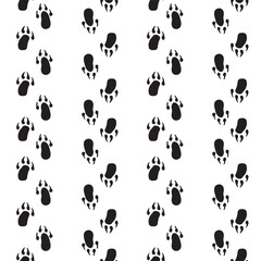 Fototapeta na wymiar Abstract seamless pattern with black animal paw. 