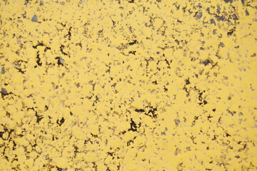 Vintage grunge texture with a touch of retro charm. Aged paper backdrop in yellow and brown, perfect for artistic designs.