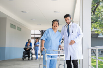 Doctor consulting senior man at hospital. Medical staff explaining diagnosis to patient. Medicine and healthcare concept.