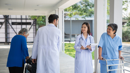 Doctor consulting senior man at hospital. Medical staff explaining diagnosis to patient. Medicine and healthcare concept.